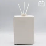 Libro profumatore bianco con scritta dorata