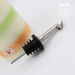 Oliera in ceramica decorata con tappo versatore