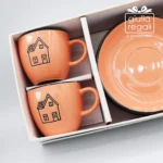Set 4 tazzine con piattino in ceramica color pesca - Decoro casetta con cuore