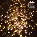 Sfera luminosa in cristallo con bolle e base LED