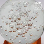 Sfera luminosa in cristallo con bolle e base LED