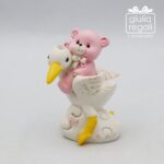 Statuina orsetto rosa su cicogna